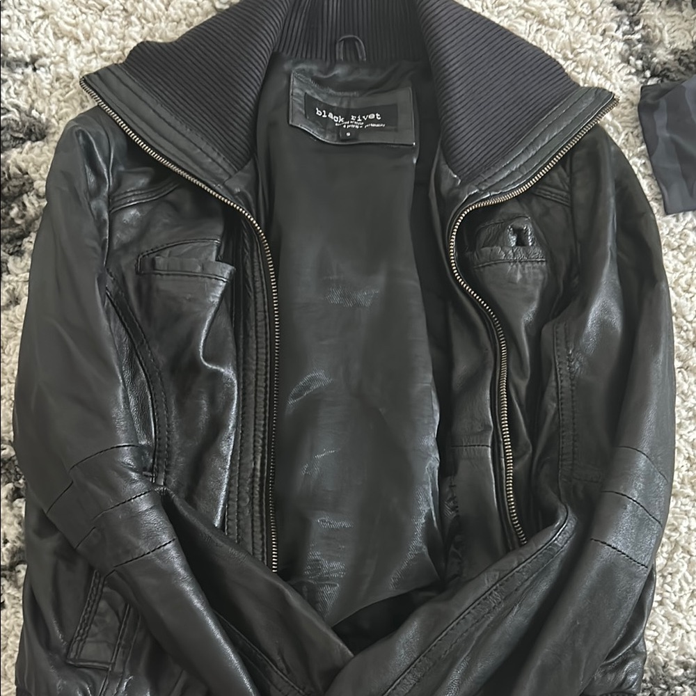 Black rivet black leather coat